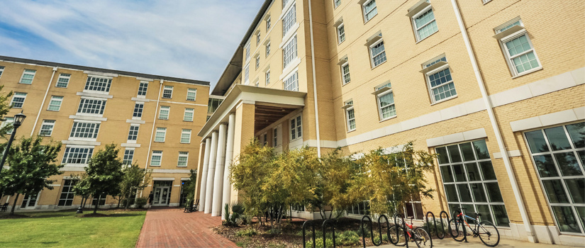 Honors residence featuring the rocking chair covered area