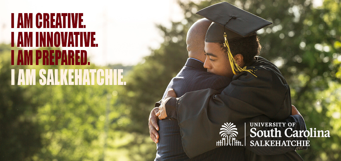 Father and Graduate embrace.  I am Salkehatchie.