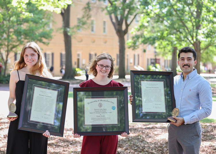 Portrait of the three major award winners from the 2023-2024 Awards day ceremony. 