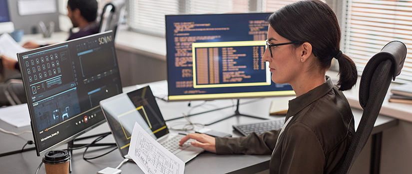 woman sitting at a computer