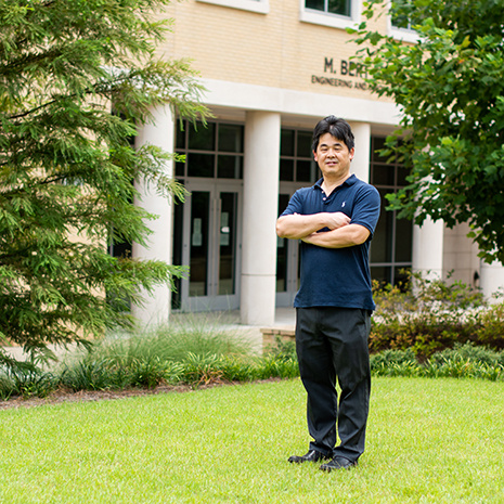 Jianjun Hu outside the Storey Building