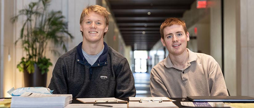 Students sitting at the VITA intake table