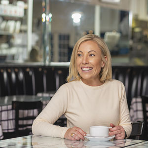 amy beth franks sits in the gourmet shop