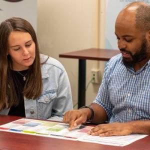 adviser speaks to student 