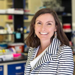 fiona hollis stands in a lab