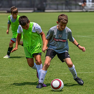 Young boys playing soccer 