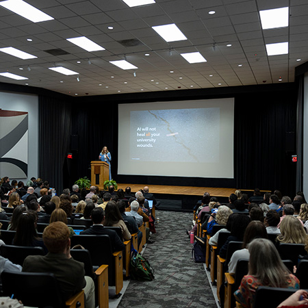 Gartner Keynote Speaker in front of a crowd of people