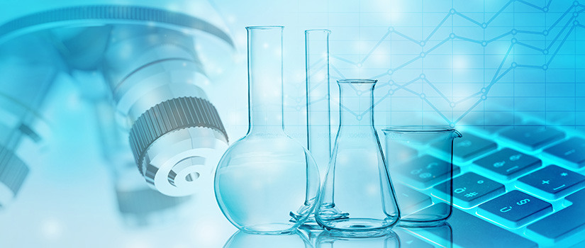 blue and white abstract image showing graphs, microscope lenses, and a computer keyboard