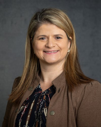 Lumi Bakos, Ph.D.