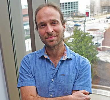 Photo of Dr. Christian O'Reilly, smiling at the camera