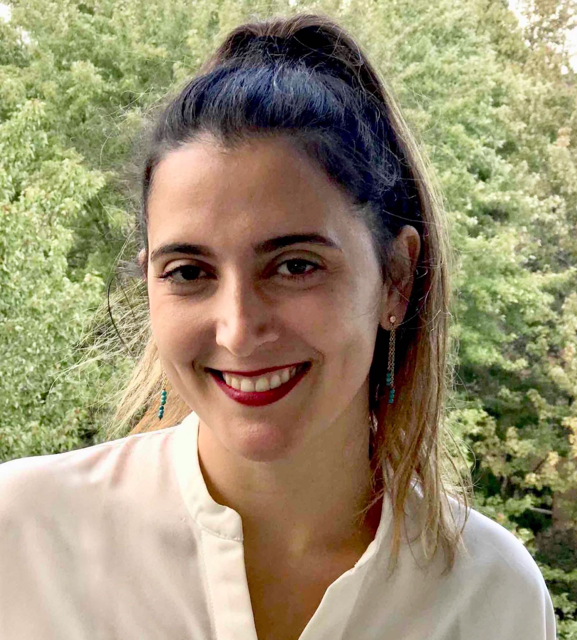 Photo of Dr. Leila Wehbe, smiling at the camera