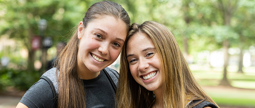 banner with students talking outside that reads "get ahead"