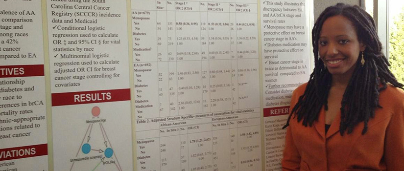 Student with research poster