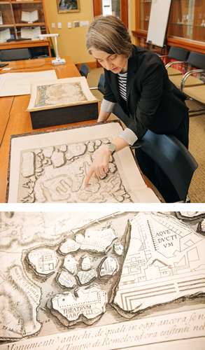 Jeanne Britton pointing to Piranesi's map of Ancient Rome.