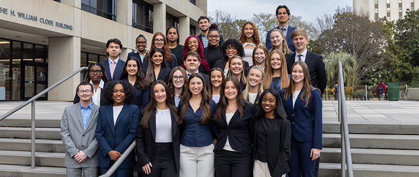 HRSM Student Leaders pose on the steps outside the Close-Hipp Building.