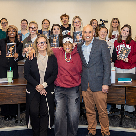 Dawn Staley poses with HRSM students and administrators