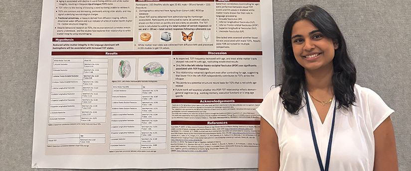 Harshitha at a research poster presentation