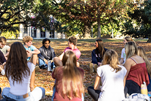 students sitting on the Horseshoe