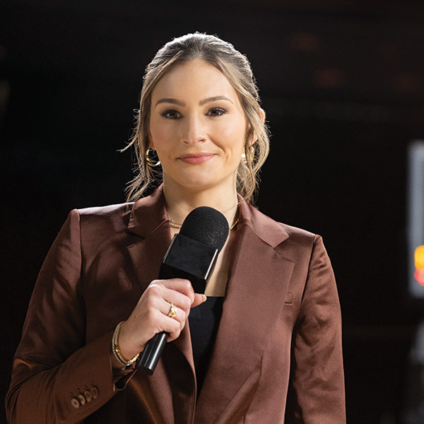 Alyssa Lang holding a microphone