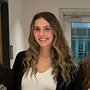 Lauren Speck stands with other members of the Theta Tau professional co-ed engineering fraternity.