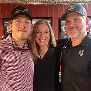 Connor Newsom with his parents Connor Newsome with his parents